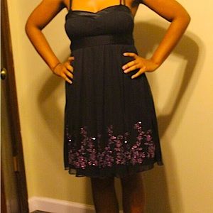 Black ballon dress medium can fit small or medium black with purple specs